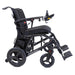 Black electric wheelchair with 'Travel Buggy' branding on a white background