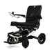 Black and white electric wheelchair on a white background