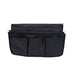 Black bag organizer with multiple pockets on a white background