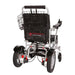 Portable electric wheelchair with basket and bag on a white background