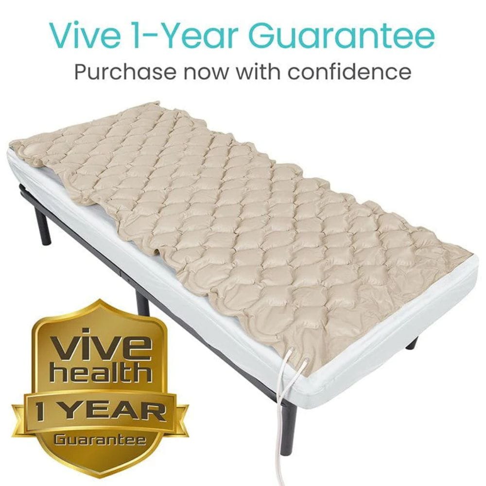 Beige heating pad on a white background with 'Vive Health' branding and 1-year guarantee offer.