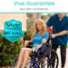 Woman in a wheelchair being assisted by a caregiver with 'Vive Guarantee' text overlay.