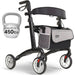 Black rollator with a gray bag labeled 'Vive Mobility' next to a kettlebell.