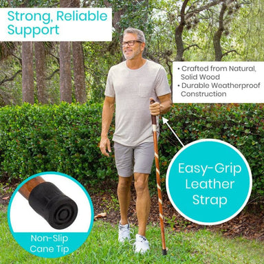 Man using a walking cane with text highlighting features like support, wood construction, leather strap, and non-slip tip.