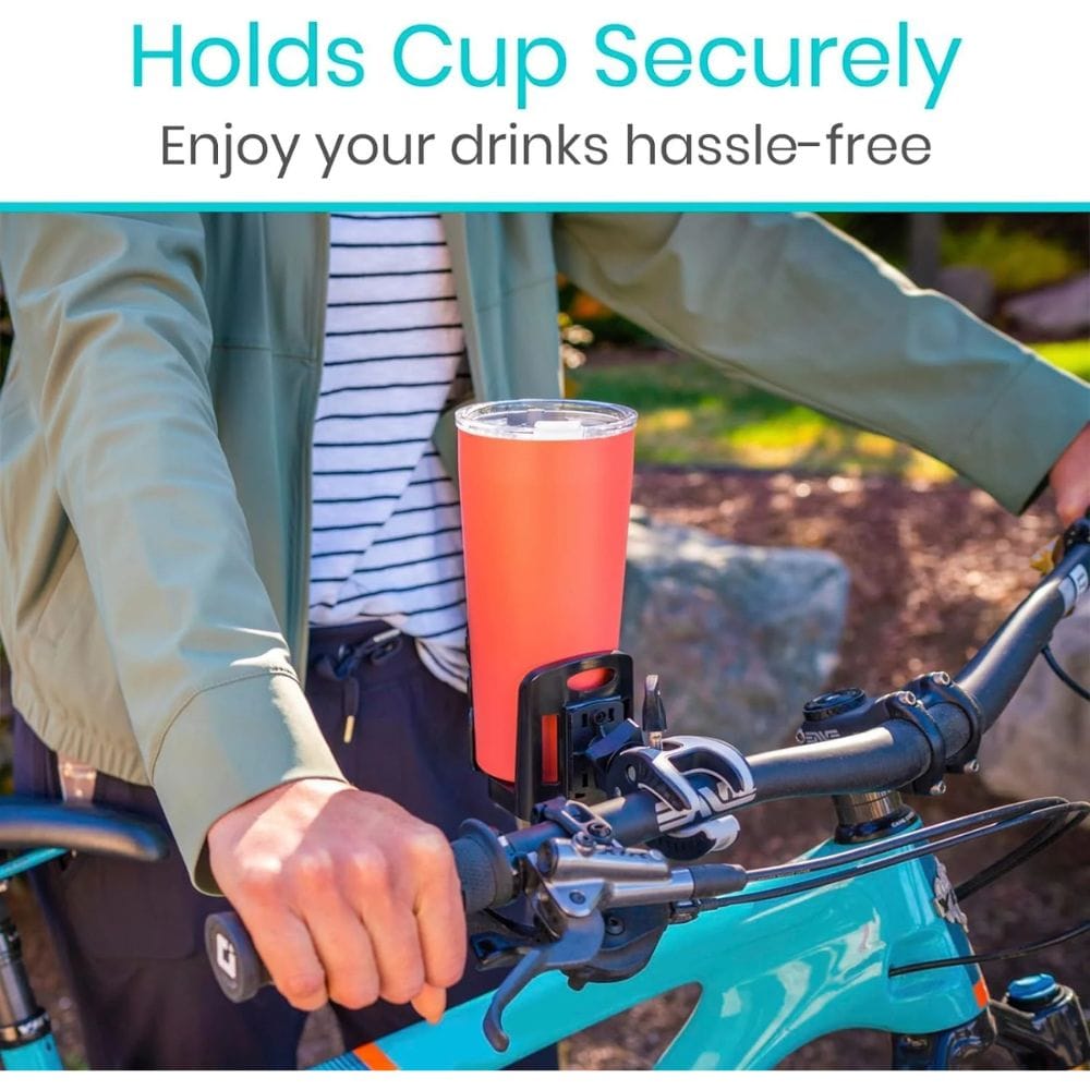 Person holding a bike-mounted cup holder with an orange cup, text 'Holds Cup Securely Enjoy your drinks hassle-free'.
