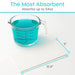Measuring cup with blue liquid on a mat, with text indicating absorbency and dimensions.