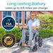 Man using a power wheelchair outdoors with 'Long Lasting Battery' and certification logos displayed.