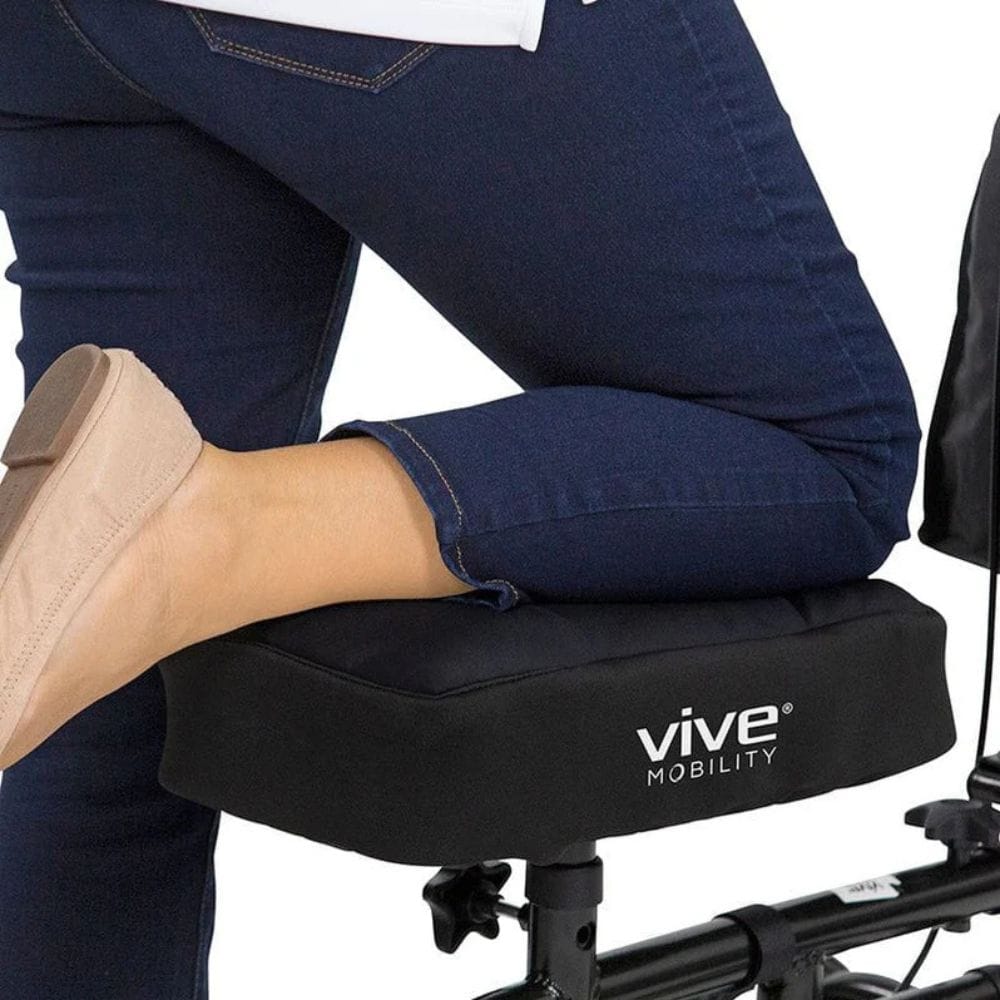 Person sitting on a Vive Mobility cushion with a white background