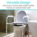 Toilet safety frame with adjustable seat on a toilet in a bathroom setting.