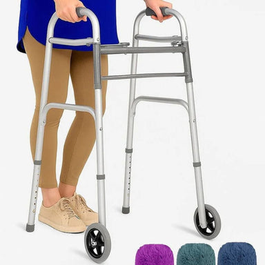 Person using a silver walker with wheels on a white background