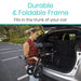 Woman loading a durable and foldable frame into the trunk of a car.
