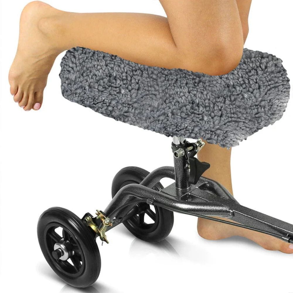 Gray knee pillow with wheels on a white background