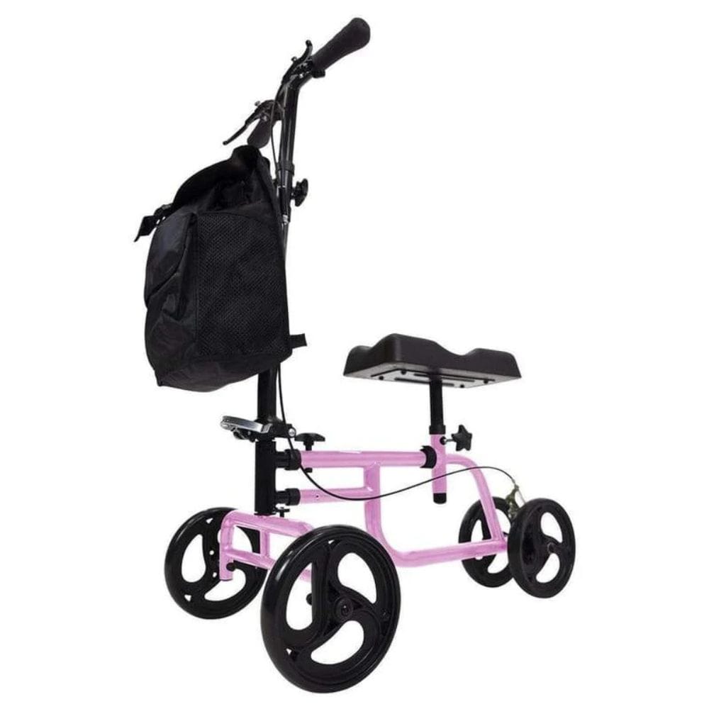 Pink knee walker with black bag on a white background