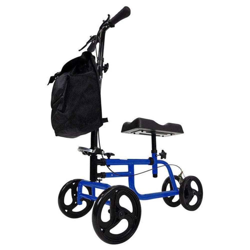 Blue knee walker with a black bag on a white background