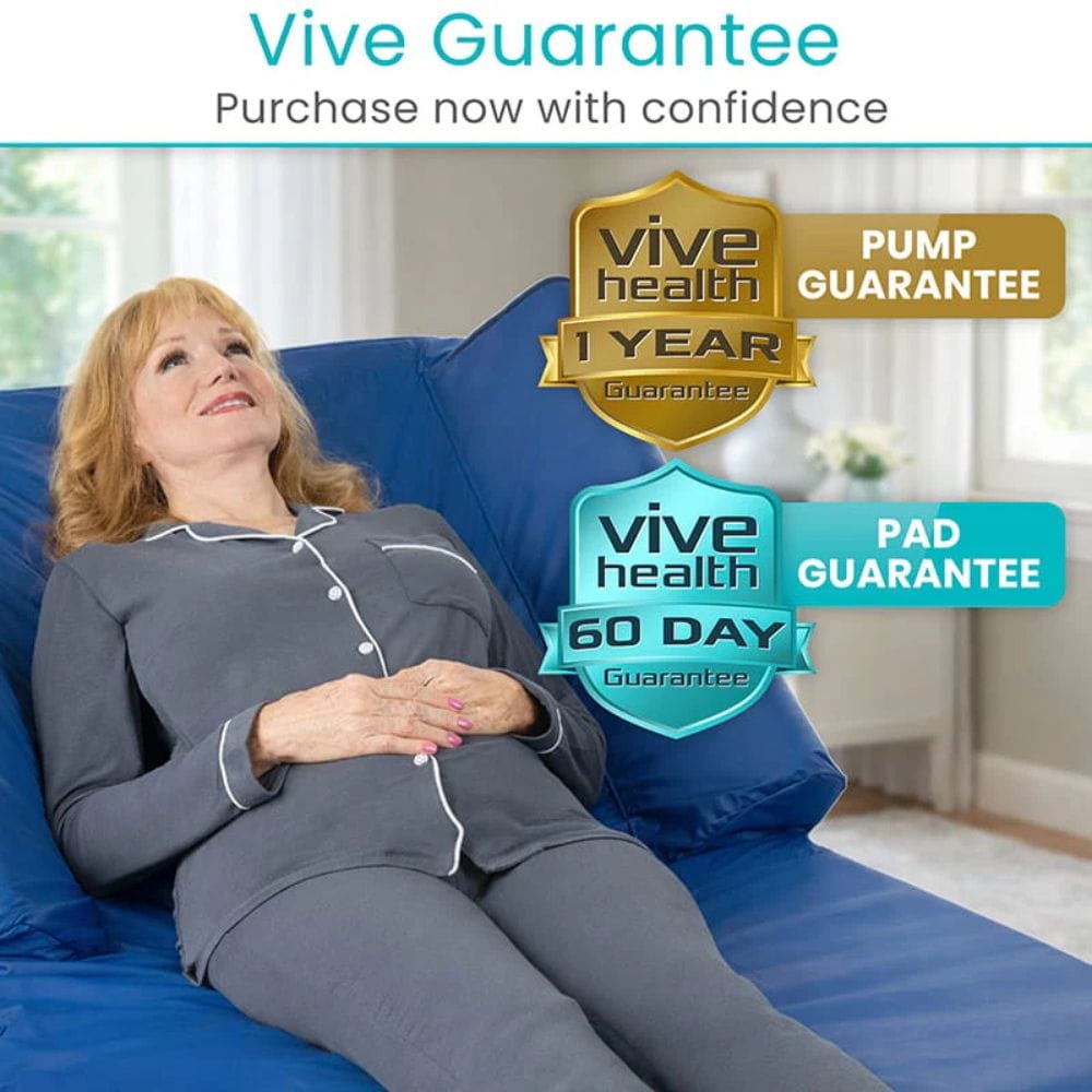 Woman in pajamas lying on a blue mattress with Vive Guarantee text and logos.