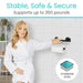 Woman in a white robe using a bathroom safety handle with text 'Stable, Safe & Secure Supports up to 350 pounds' and 'Stainless Steel' icon.