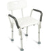 White shower chair with gray arms and legs on a white background