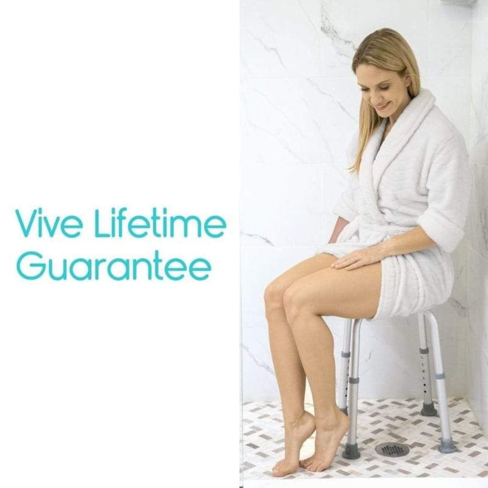 Woman in a white robe using a Vive product in a bathroom setting with 'Vive Lifetime Guarantee' text.