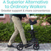 Person using a scooter with text 'A Superior Alternative to Ordinary Walkers' and 'Greater support & more convenience'.