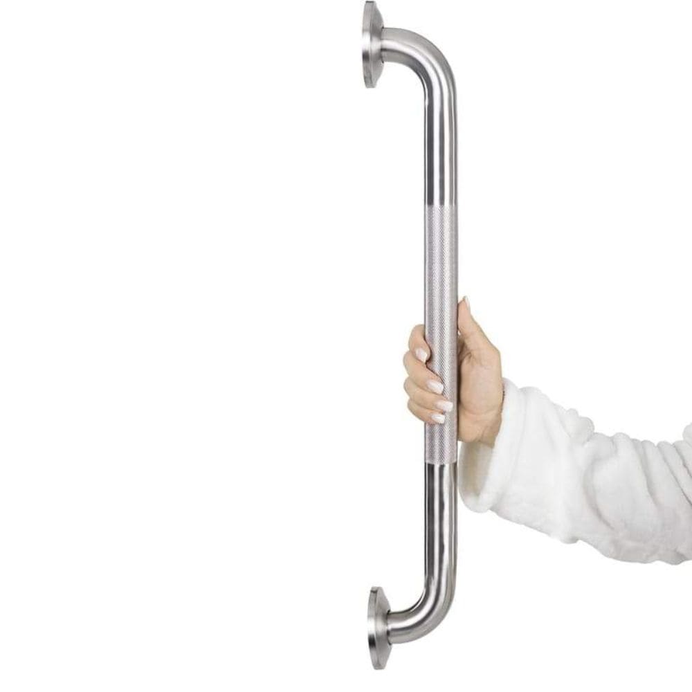 Hand holding a stainless steel grab bar against a white background