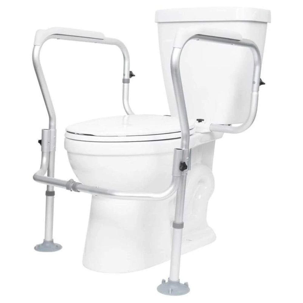 White toilet with a metal safety frame on a white background