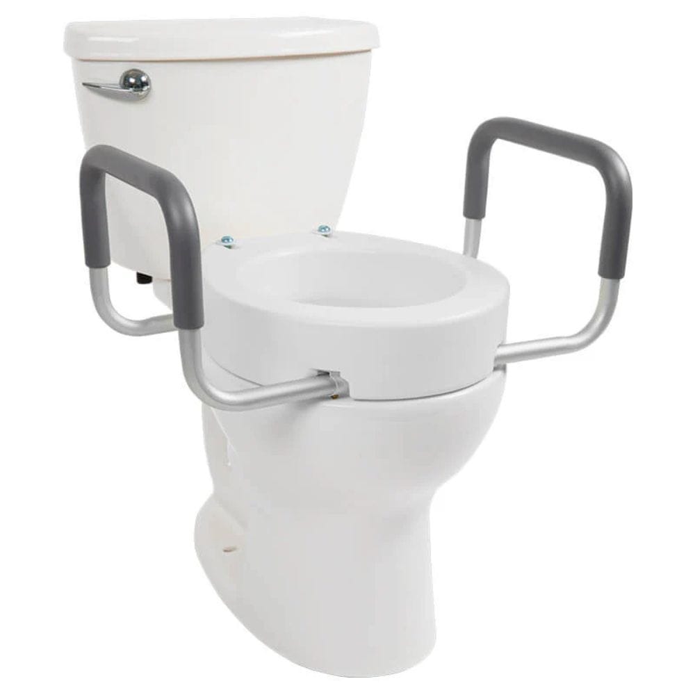 White toilet with gray handrails on a white background