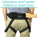 Person wearing a black 'vive' patient transfer belt with text about safely moving patients.