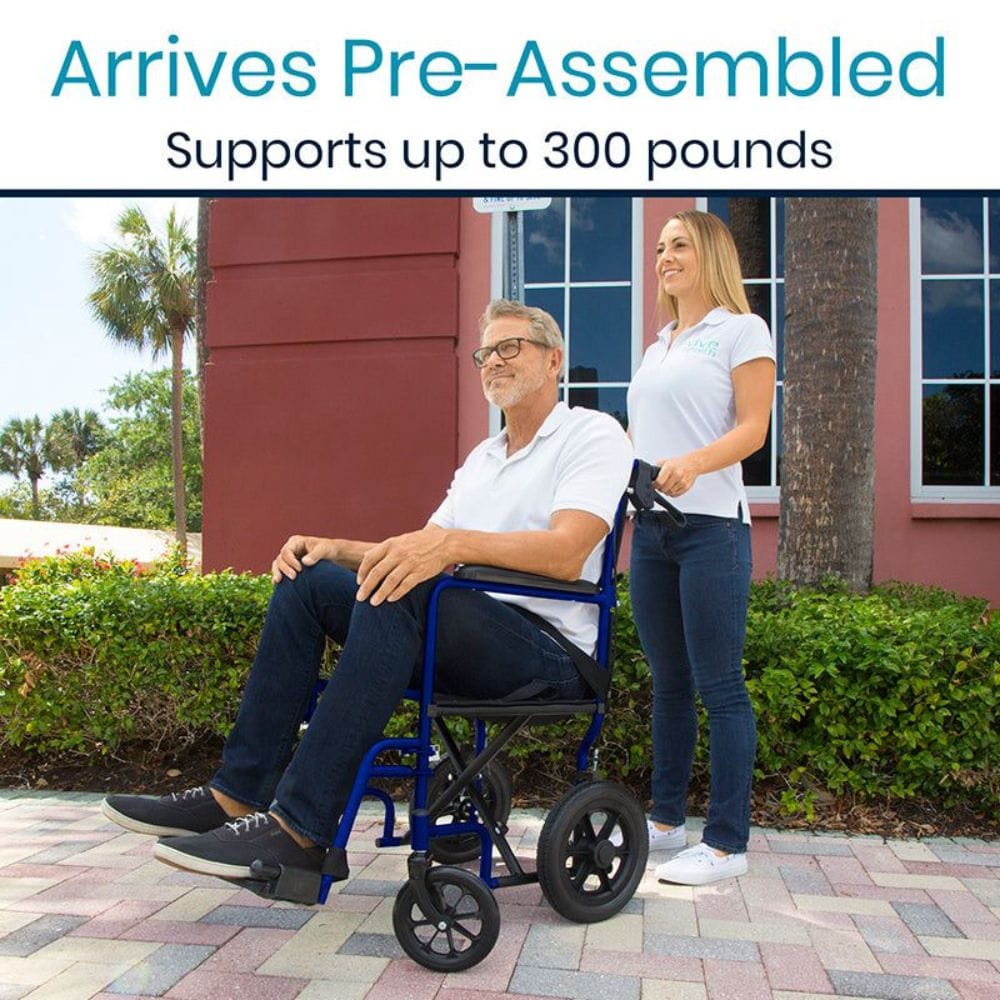 Man using a wheelchair with a woman standing beside him, outdoors.