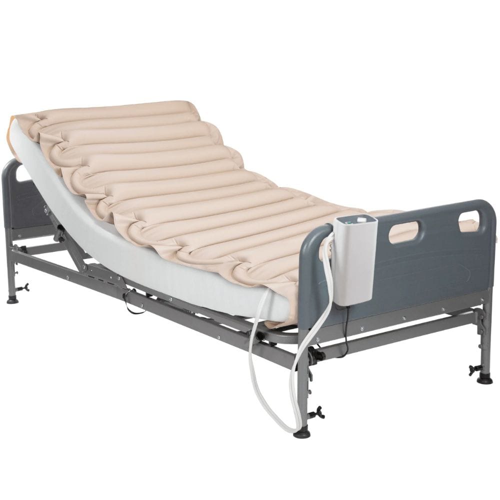 Hospital bed with an air mattress on a white background