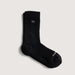 Black sock with a logo on a light gray background