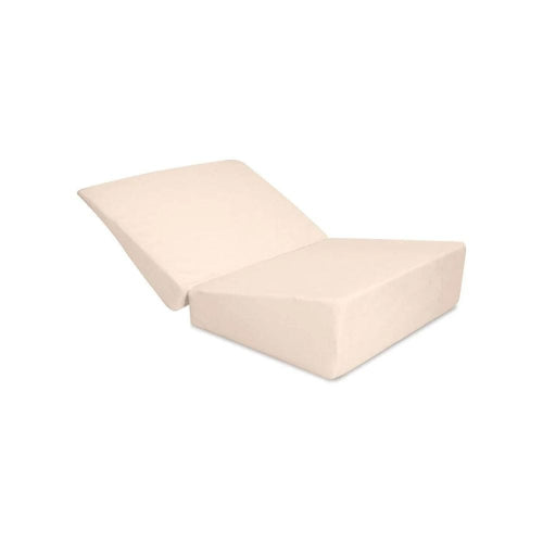 A light beige wedge bed support pillow shown on a plain white background.