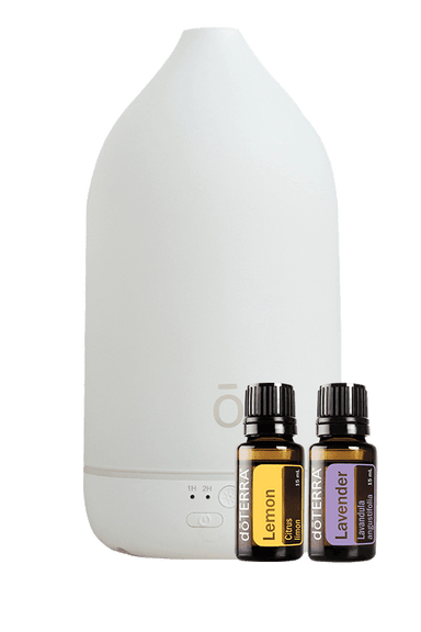 A white diffuser bottle with two small essential oil bottles labeled Lemon and Lavender, shown on a clean white background.